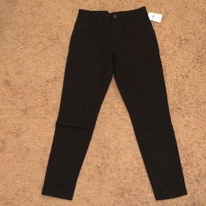 Black skinny jeans. High waisted.